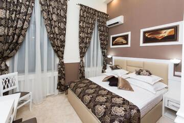 Фото номера Стандартный двухместный номер с 1 кроватью Отель La Strada Boutique Villa г. Питешти 3
