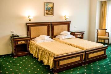 Фото номера Стандартный двухместный номер с 2 отдельными кроватями Отель Hotel Victoria г. Питешти 3